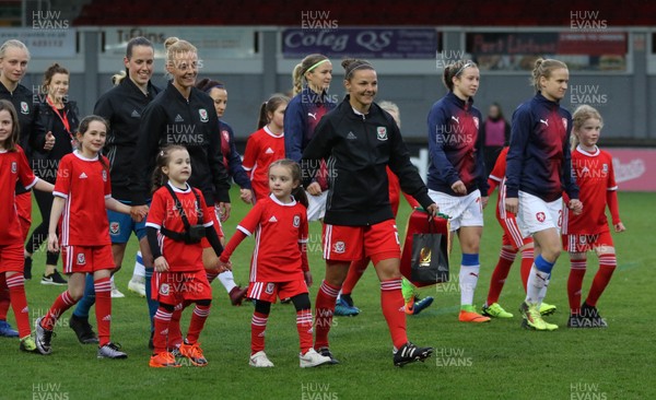 040419 - Wales v Czech Republic, Women's International Challenge Match - Loren Dykes of Wales leads the Welsh team out as she wins her 100th cap