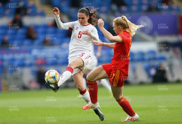 130421 Wales Women v Denmark Women, International Friendly match - Simone Boye Sorensen of Denmark clears the ball as Ceri Holland of Wales challenges