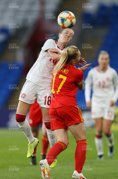 130421 Wales Women v Denmark Women, International Friendly match - Sara Thrige of Denmark wins the ball as Ceri Holland of Wales challenges