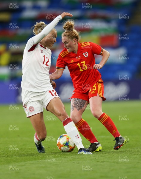 130421 Wales Women v Denmark Women, International Friendly match - Rachel Rowe of Wales gets past Stine Larsen of Denmark