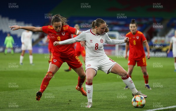 130421 Wales Women v Denmark Women, International Friendly match - Emma Snerle of Denmark holds off Kayleigh Green of Wales