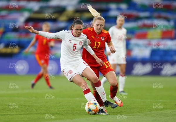 130421 Wales Women v Denmark Women, International Friendly match - Simone Boye Sorensen of Denmark holds off Ceri Holland of Wales