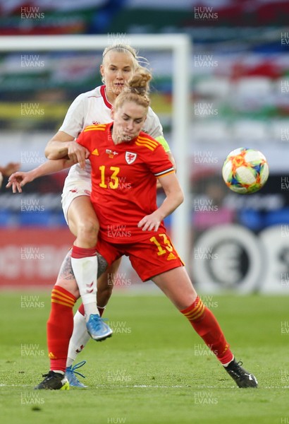 130421 Wales Women v Denmark Women, International Friendly match - Rachel Rowe of Wales is challenged by Pernille Harder of Denmark