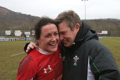 14.02.09 The Women's 6 Nations. Wales vs. England. Taffs Well RFC, Cardiff, Wales. 
 
Wales captain Mellissa Berry is congratulated by coach Jason Lewis after Wales edge out England 16-15 at Taffs well RFC, Cardiff. 
 
