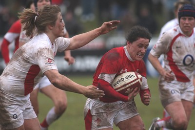 14.02.09 The Women's 6 Nations. Wales vs. England. Taffs Well RFC, Cardiff, Wales. 
 
Melissa Berry charges toward the England tryline as opposite number Catherine Spencer chases her down. 
 
