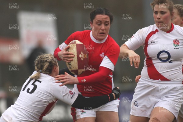 14.02.09 The Women's 6 Nations. Wales vs. England. Taffs Well RFC, Cardiff, Wales. 
 
Captain Mellissa Berry leads by example as she powers through Victoria Massarella's tackle. 
 
