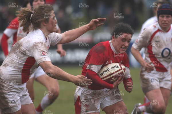 14.02.09 The Women's 6 Nations. Wales vs. England. Taffs Well RFC, Cardiff, Wales. 
 
Melissa Berry charges toward the England tryline as opposite number Catherine Spencer chases her down. 
 
