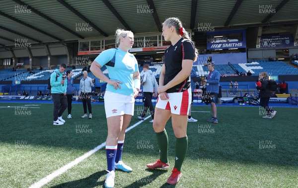 150423 - Wales v England, TicTok Women’s 6 Nations - Wales captain Hannah Jones and Marlie Packer of England at the coin toss