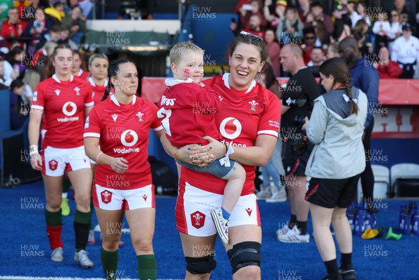 150423 - Wales v England, TicTok Women’s 6 Nations - Natalia John of Wales with her nephew Morgan who is fighting a rare cancer walks out for the match