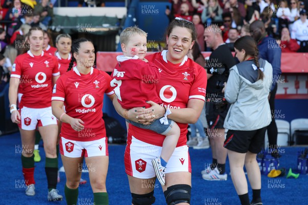 150423 - Wales v England, TicTok Women’s 6 Nations - Natalia John of Wales with her nephew Morgan who is fighting a rare cancer walks out for the match