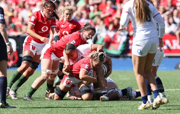 150423 - Wales v England, TicTok Women’s 6 Nations - Alex Callender of Wales is tackled short off the line