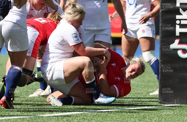 150423 - Wales v England, TicTok Women’s 6 Nations - Kelsey Jones of Wales is tackled short off the line