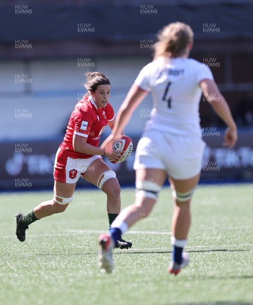 150423 - Wales v England, TicTok Women’s 6 Nations - Sioned Harries of Wales takes on Zoe Aldcroft of England