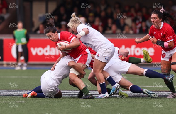 150423 - Wales v England, TicTok Women’s 6 Nations - Sioned Harries of Wales is tackled