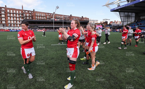 150423 - Wales v England, TicTok Women’s 6 Nations - Robyn Wilkins of Wales and Abbie Fleming of Wales applaud the fans at the end of the match