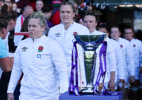 150423 - Wales v England, TicTok Women’s 6 Nations - Marlie Packer of England leads her team out for the match passed the Women’s Six Nations Trophy
