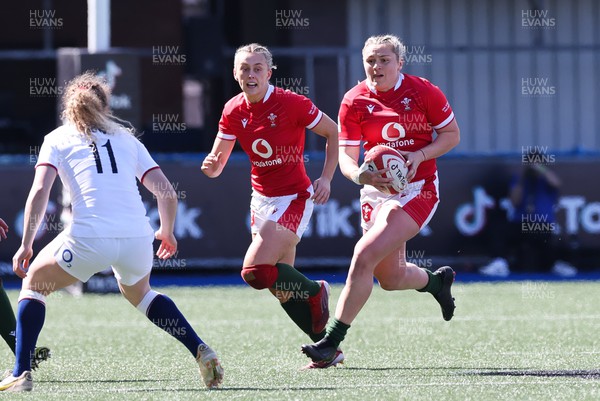 150423 - Wales v England, TicTok Women’s 6 Nations - Hannah Bluck of Wales and Hannah Jones of Wales take on Abby Dow of England