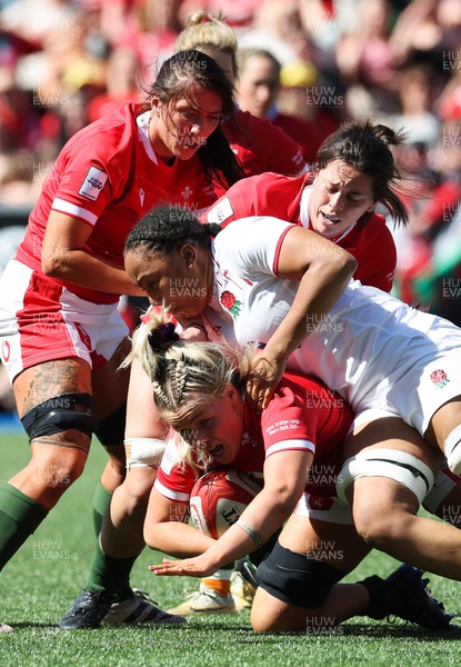 150423 - Wales v England, TicTok Women’s 6 Nations - Alex Callender of Wales is tackled