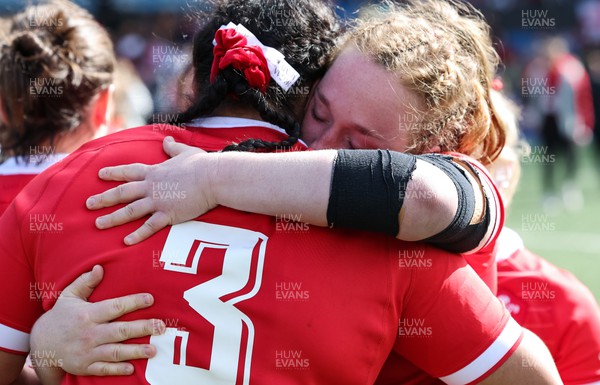 150423 - Wales v England, TicTok Women’s 6 Nations - Sisilia Tuipulotu of Wales and Abbie Fleming of Wales embrace at the end of the match