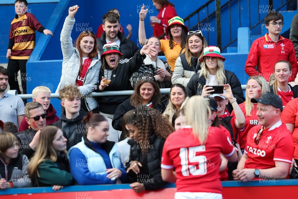 150423 - Wales v England, TicTok Women’s 6 Nations - Courtney Keight of Wales meets family, friends and fans at the end of the match