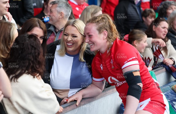 150423 - Wales v England, TicTok Women’s 6 Nations - Abbie Fleming of Wales meets family, friends and fans at the end of the match