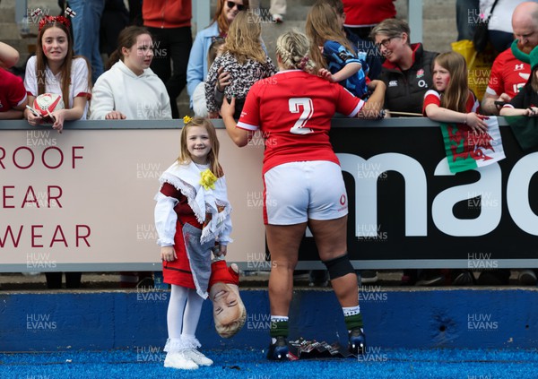 150423 - Wales v England, TicTok Women’s 6 Nations - Kelsey Jones of Wales greets family, friends and fans at the end of the match