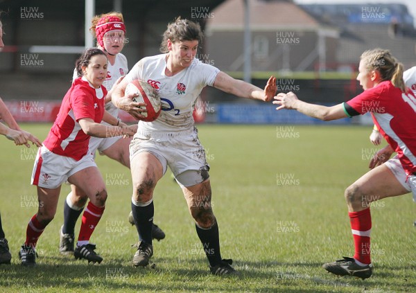 170313 Wales v England- Women's 6 Nations Championship -England's Sarah Hunter hands off Wales' Elinor Snowsill to score