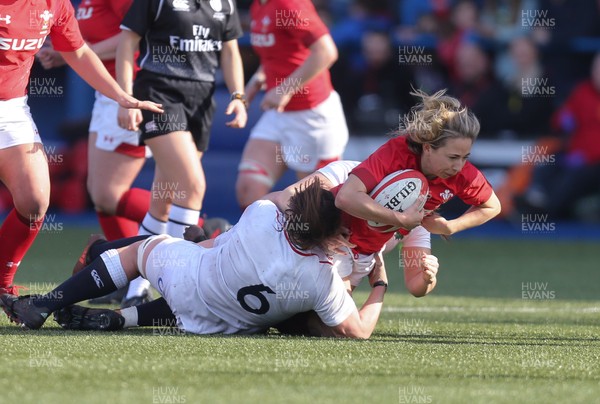 240219 - Wales v England, Women's Six Nations Championship 2019 - Elinor Snowsill of Wales is tackled by Sarah Beckett of England