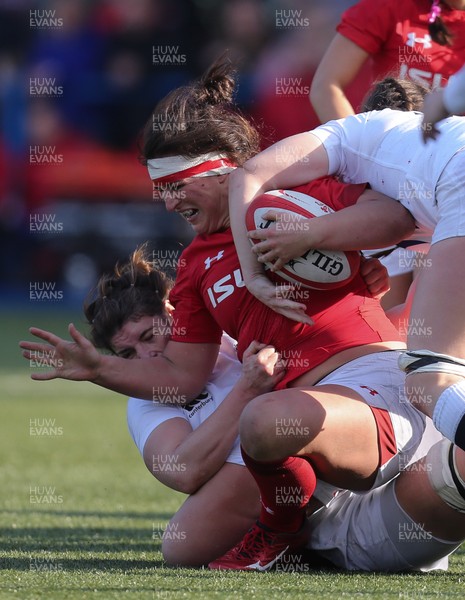 240219 - Wales v England, Women's Six Nations Championship 2019 - Siwan Lillicrap of Wales is stopped by the English defence