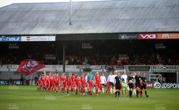 310818 - Wales Women v England Women - FIFA World Cup Qualifier - Wales walk onto the pitch