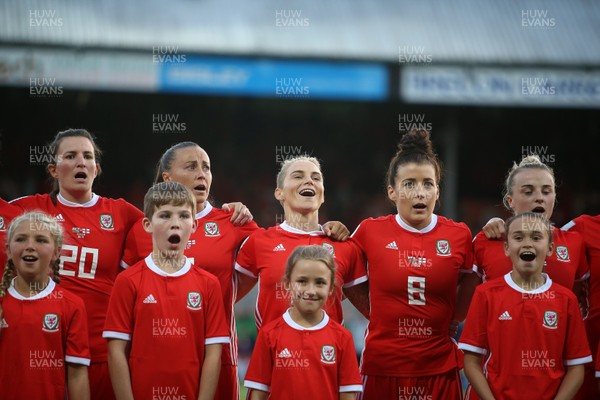 310818 - Wales Women v England Women - FIFA World Cup Qualifier - Jess Fishlock of Wales and team mates sing the anthem