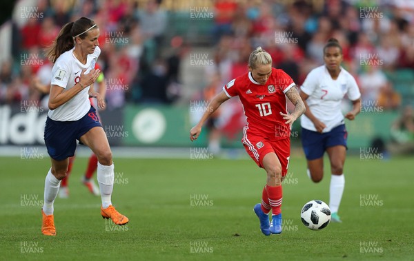 310818 - Wales Women v England Women - FIFA World Cup Qualifier - Jess Fishlock of Wales is challenged by Jill Scott of England