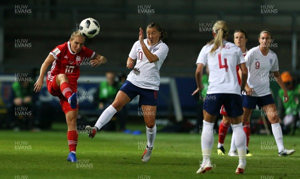 310818 - Wales Women v England Women - FIFA World Cup Qualifier - Jess Fishlock of Wales is challenged by Francesca Kirby of England
