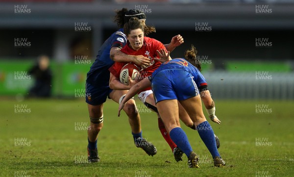 160318 - Wales Women v France Women - Natwest 6 Nations Championship - Robyn Wilkins of Wales is tackled by Celine Ferer and Carla Neisen of France
