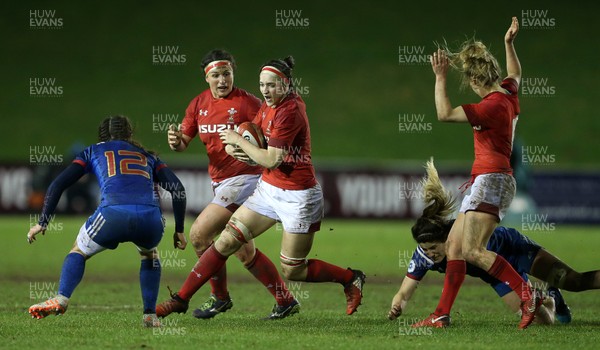 160318 - Wales Women v France Women - Natwest 6 Nations Championship - Mel Clay of Wales is tackled by Jade Le Pesq of France