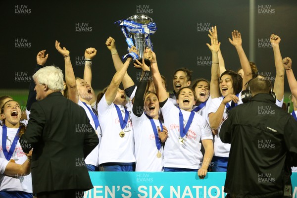 160318 - Wales Women v France Women - Natwest 6 Nations Championship - France lift the trophy after winning the Grand Slam