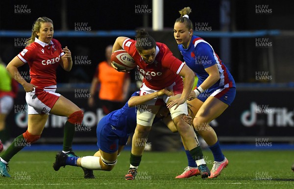 220422 - Wales Women v France Women - TikTok Women’s Six Nations - Sioned Harries of Wales is tackled by Gaelle Hermet of France
