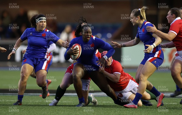 220422 - Wales Women v France Women - TikTok Womens Six Nations - Madoussou Fall of France is tackled by Siwan Lillicrap and Carys Phillips of Wales