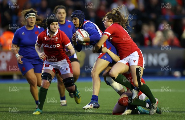 220422 - Wales Women v France Women - TikTok Womens Six Nations - Caroline Boujard of France is tackled by Robyn Wilkins of Wales