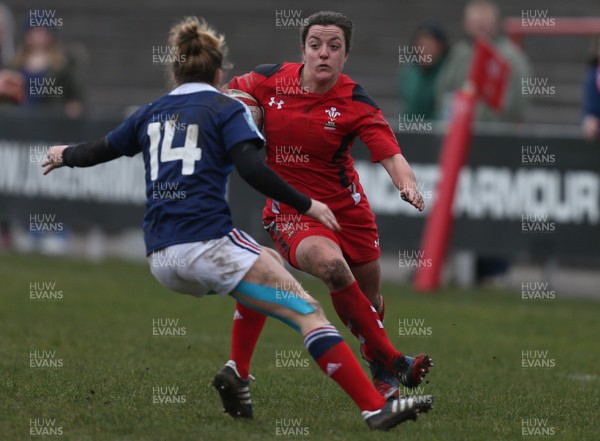 230214 - Wales Women v France Women, Women's Six Nations Championship - Wales' Elen Evans take son France's Marion Lievre