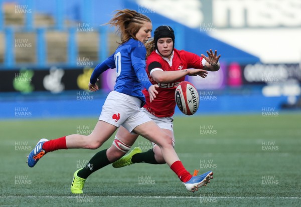 230220 - Wales Women v France Women, Womens Six Nations Championship 2020 - Bethan Lewis of Wales looks to charge down the kick from Pauline Bourdon of France