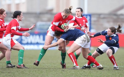 28.02.10 ... Wales Women v France Women, Womens Six Nations, Bridgend -  Wales' Naomi Thomas is tackled  