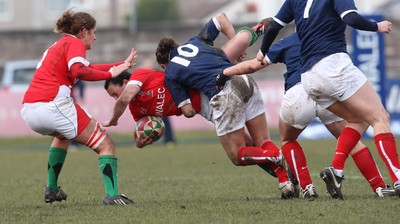 28.02.10 ... Wales Women v France Women, Womens Six Nations, Bridgend -  Wales' Awen Thomas is tackled by France's Aurelie Bailon   