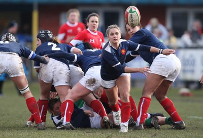28.02.10 ... Wales Women v France Women, Womens Six Nations, Bridgend -  France's Marie-Alice Yahe feeds the ball out 