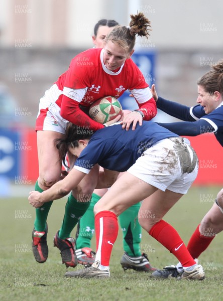 28.02.10 ... Wales Women v France Women, Womens Six Nations, Bridgend -  Wales' Clare Flowers is tackled  