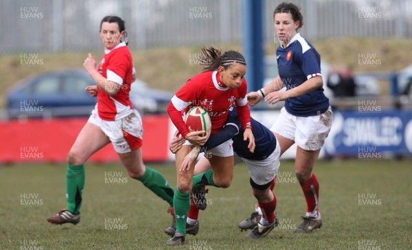 28.02.10 ... Wales Women v France Women, Womens Six Nations, Bridgend -  Wales' Non Evans is tackled  