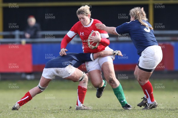 28.02.10 ... Wales Women v France Women, Womens Six Nations, Bridgend -  Wales' Gemma Hallett is tackled  