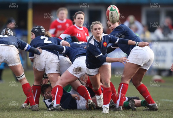 28.02.10 ... Wales Women v France Women, Womens Six Nations, Bridgend -  France's Marie-Alice Yahe feeds the ball out 