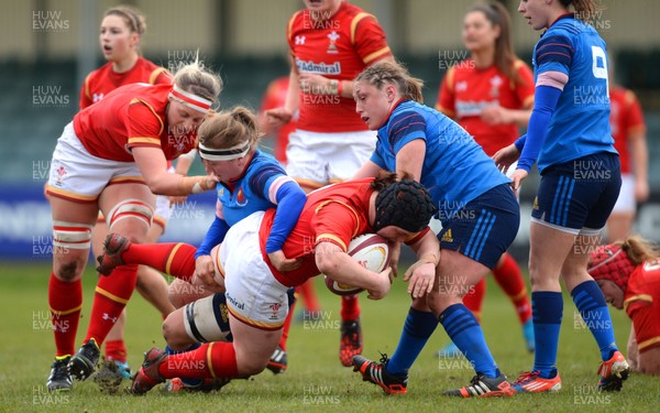 280216 - Wales Women v France Women - RBS Womens Six Nations 2016 -Megan York of Wales is tackled by Laetitia Grand and Pauline Rayssac of France