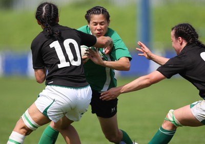 01.08.10.. Wales Women v Ireland Women, Women's Rugby World Cup 2010 Warm-Up Fixture -  Wales' Naomi Thomas is tackled by Ireland's Tania Rosser (lt) and Sinead Ryan  